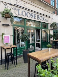 Garden view of Loose Box pub.