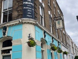 Exterior of PineApple pub.